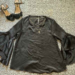 Black, flowy-sleeve blouse